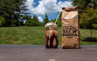 coffee product with latte in mason jar