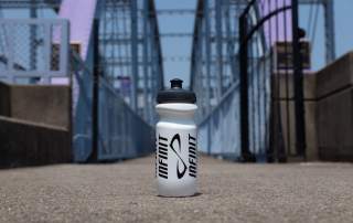 water bottle with bridge in background